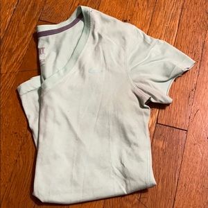 Woman’s v-neck dri fit Nike shirt
